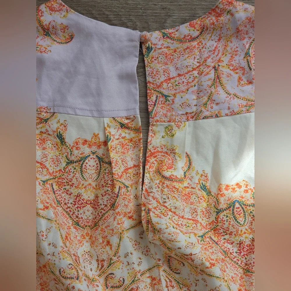 This is a Free People Blooming Fields wide-legged jumpsuit with a paisley bohemi - Picture 8 of 10